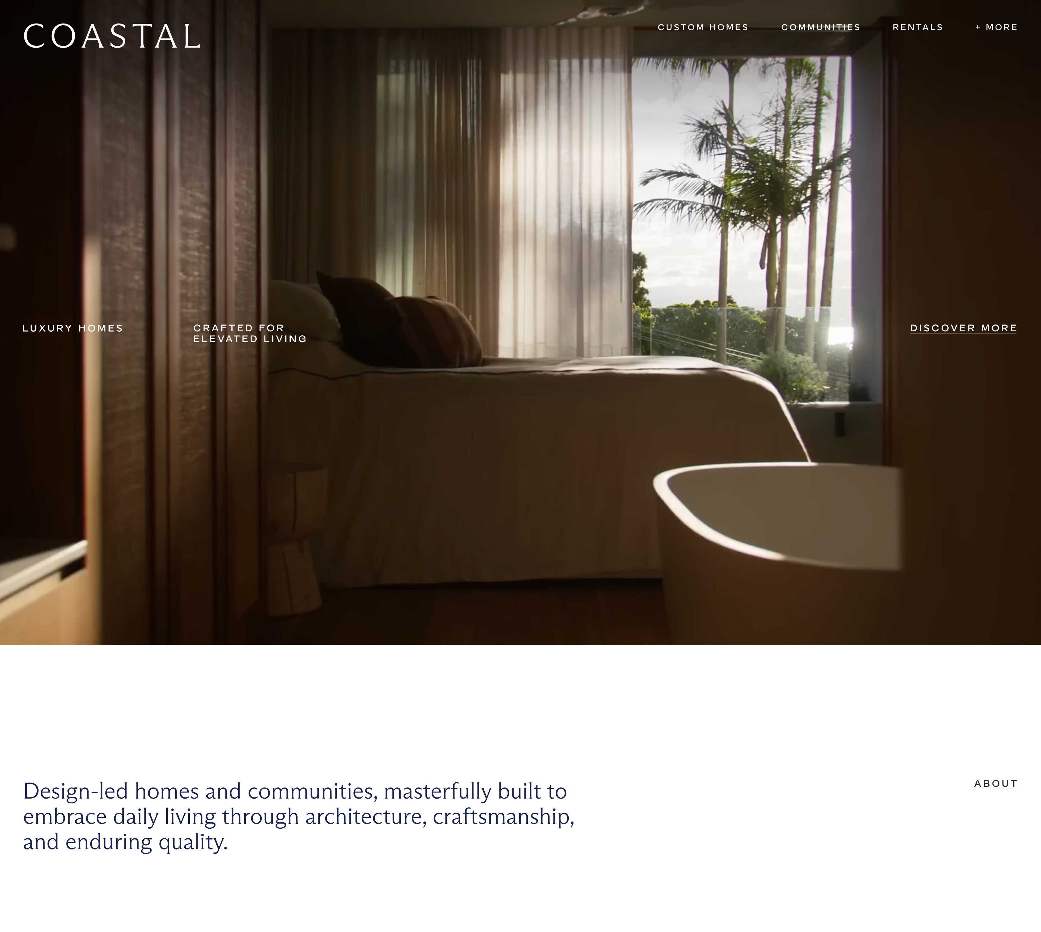 Person sitting on couch working on laptop